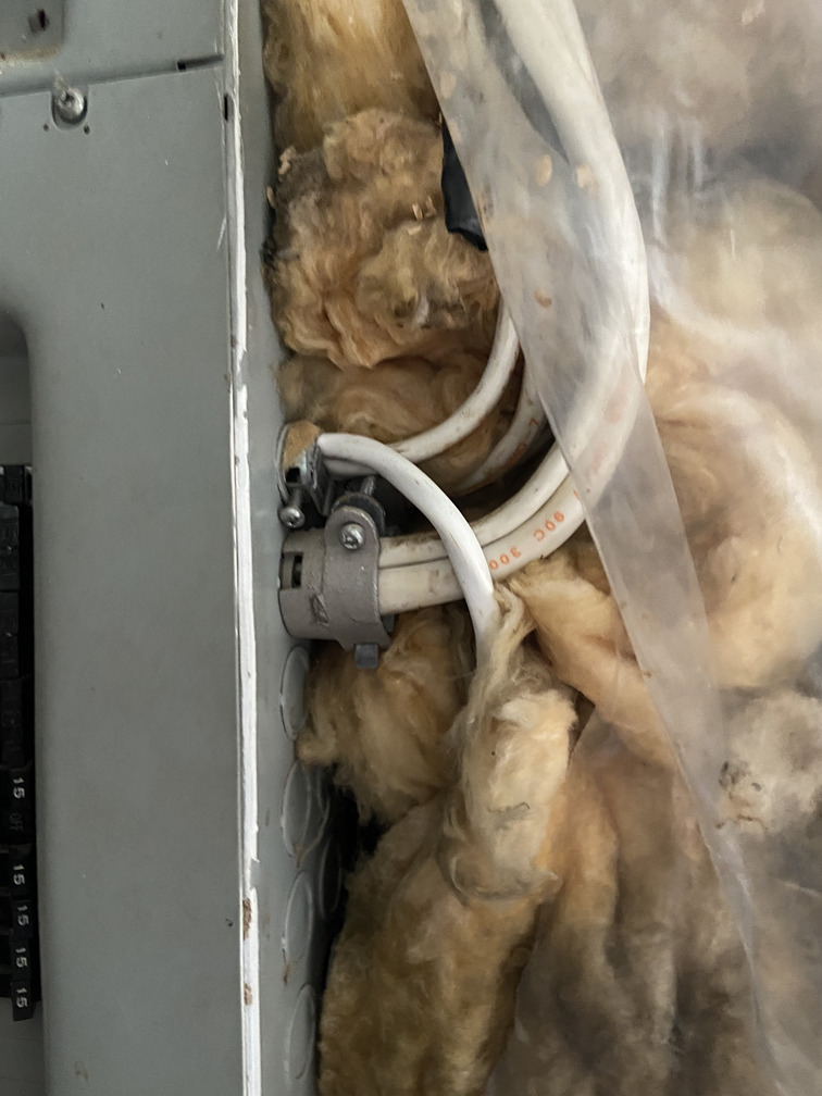 Power cables coming out of a breaker box